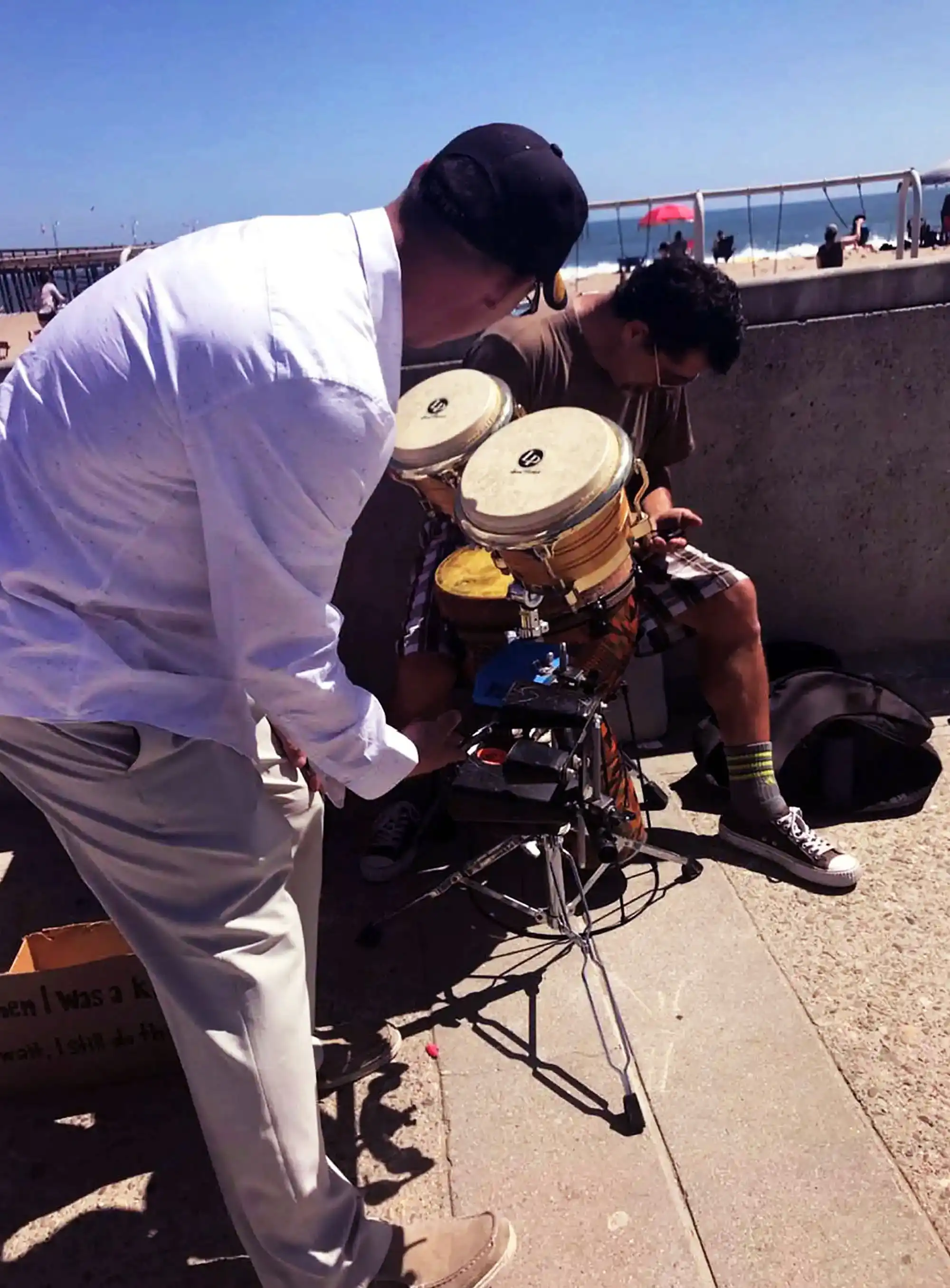 Veteran David Haave playing the bongos for a fund raiser to help homeless Veterans, Ventura, CA, USA. -- David Haave